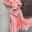 FJØRNA pink off-shoulder midi dress for women, elegant A-line design, perfect for stylish occasions.