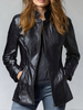FJØRNA black vintage faux leather jacket with stand collar, stylish and classic for a timeless fashion look.