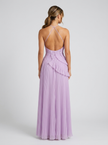FJØRNA women's pleated halter maxi dress with ruffle details, perfect for wedding guest attire, shown in a stylish fashion image.