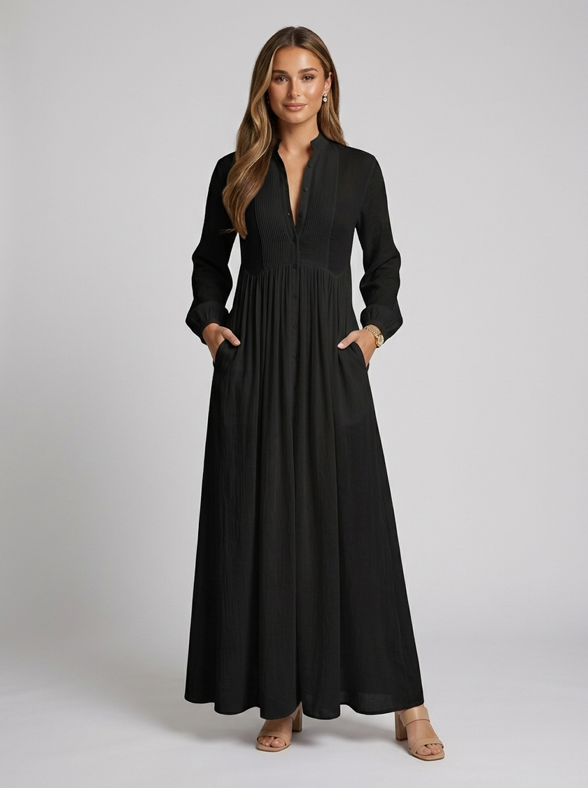 FJØRNA women's button front maxi dress with long sleeves, perfect for summer, featuring a flowy design and vibrant fabric.