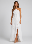 FJØRNA women's pleated halter maxi dress with ruffles, ideal for wedding guests, in a stylish and elegant design.