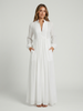 FJØRNA women's button front maxi dress with long sleeves, perfect for summer, featuring a flowing fabric and stylish design.