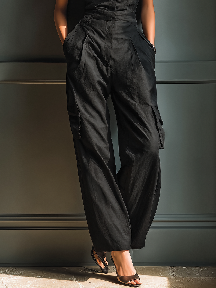 FJØRNA women's cotton-linen sleeveless jumpsuit with collared neckline, cargo pockets, and wide-leg pants, casual summer style.