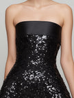 FJØRNA strapless satin-trim sequin A-line mini dress with shimmering sequins and a sleek, fitted silhouette.