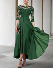 FJØRNA chiffon midi dress for women, A-line style with three-quarter sleeves, flowing fabric and elegant design.