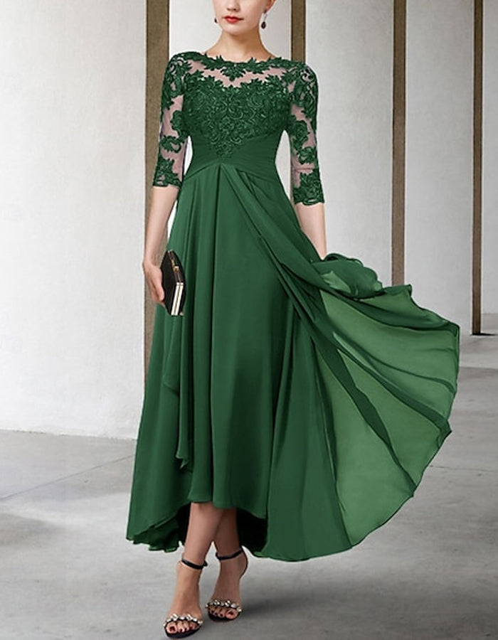 FJØRNA chiffon midi dress for women, A-line style with three-quarter sleeves, flowing fabric and elegant design.