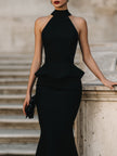 FJØRNA halter peplum midi dress for women, stylish sleeveless dress with fitted bodice and flared skirt, perfect for elegant occasions.