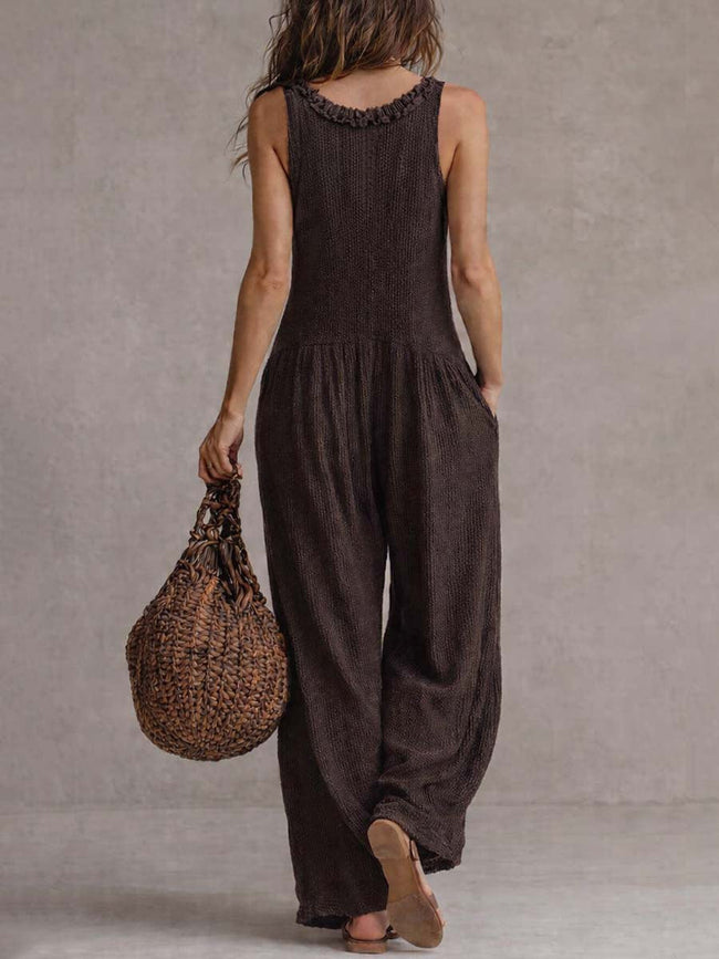 FJØRNA brown retro sleeveless knitted jumpsuit with ruffle neck and ruffled details, stylish and vintage-inspired casual wear.