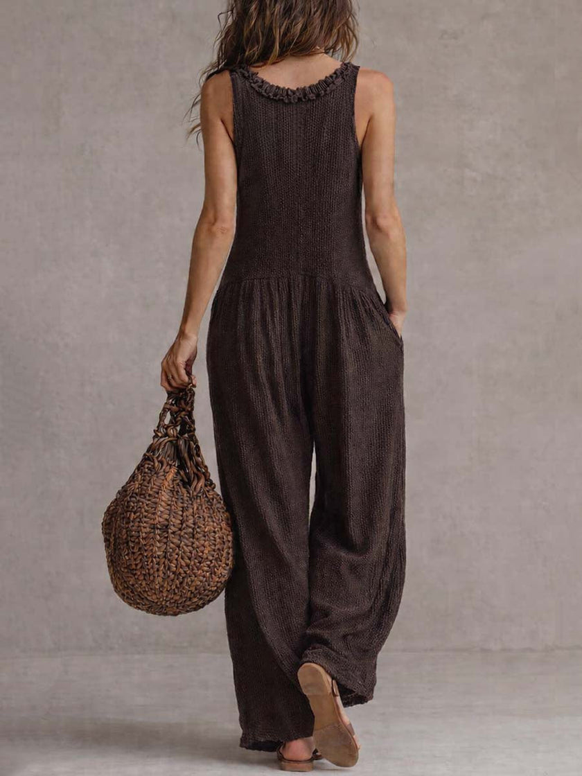 FJØRNA brown retro sleeveless knitted jumpsuit with ruffle neck and ruffled details, stylish and vintage-inspired casual wear.