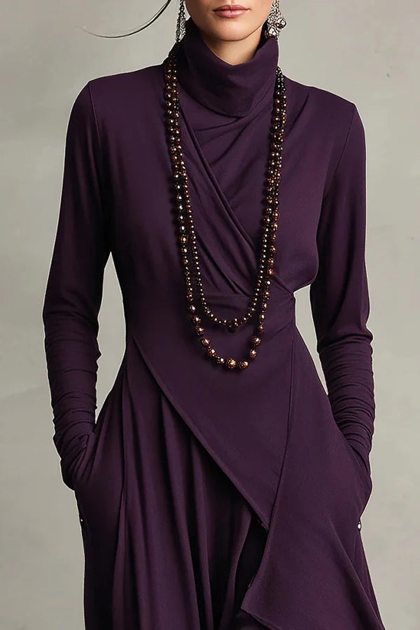 FJØRNA solid color high-neck long-sleeved casual maxi dress with irregular hemline on a model.