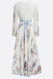 FJØRNA printed V-neck long sleeve maxi dress with bow tie waist, perfect for holiday occasions and stylish events.