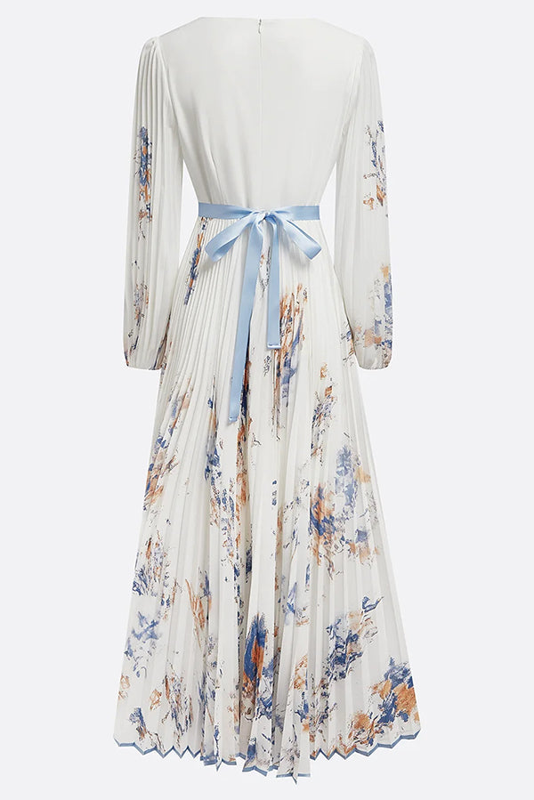 FJØRNA printed V-neck long sleeve maxi dress with bow tie waist, perfect for holiday occasions and stylish events.