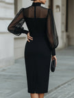 FJØRNA high-neck midi dress with sheer long sleeves and tailored fit, elegant and stylish for formal occasions.
