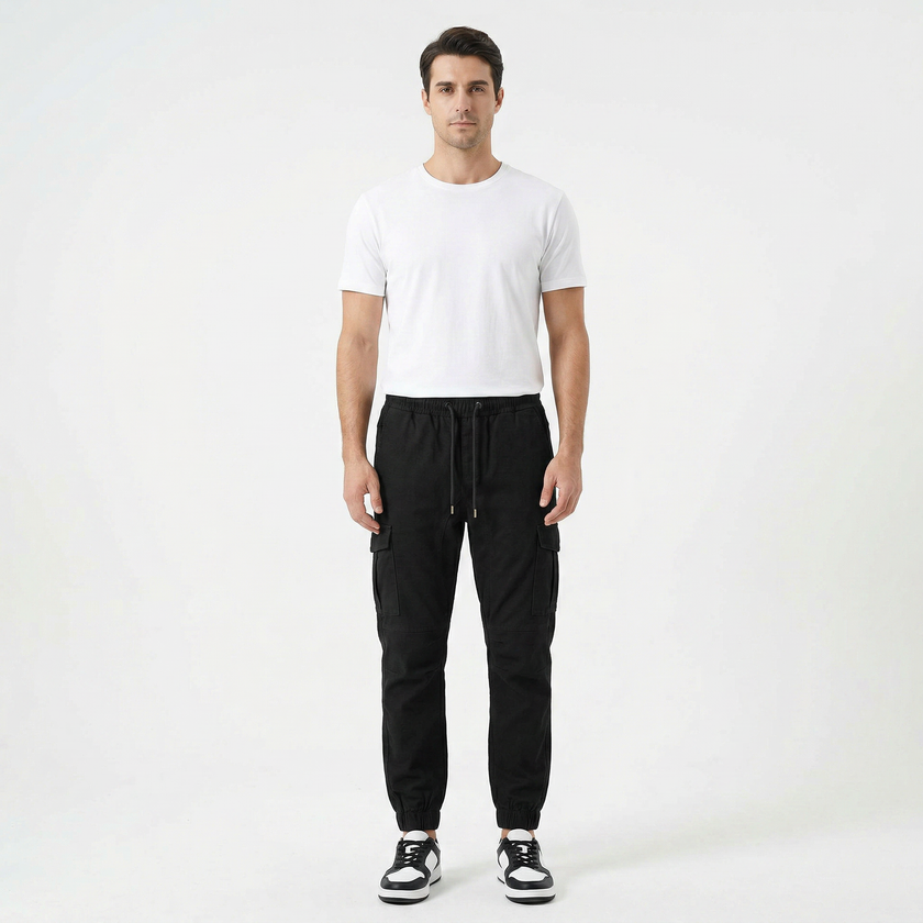 Men's slim fit cotton cargo trousers by FJØRNA, featuring multiple pockets and a modern tapered design.