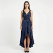 Women's elegant sleeveless wrap midi dress by FJØRNA, showcasing a stylish design with a fitted waist and flowing fabric.