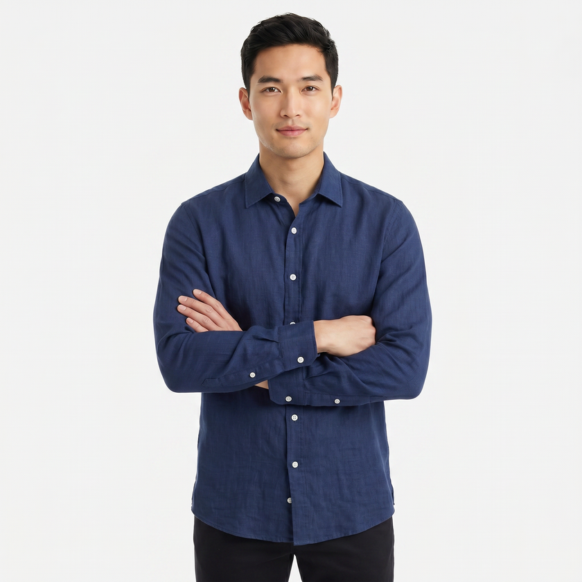 Men's FJØRNA long sleeve linen button-down shirt, lightweight and breathable, shown in a natural fabric and classic design.