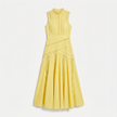 FJØRNA women's sleeveless midi dress with lace panels, fitted bodice, and flowing skirt, perfect for elegant occasions.
