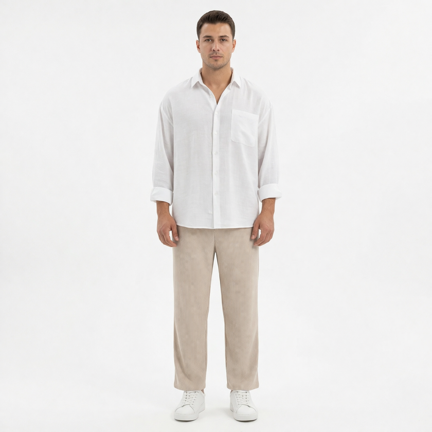 Men's wide-leg summer pants by FJØRNA, casual fit with lightweight fabric, shown in a natural standing pose.
