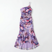 FJØRNA women's floral A-line maxi dress with a flowy silhouette and vibrant botanical print, perfect for summer occasions