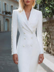 White pearl-trim double-breasted blazer dress for women by FJØRNA, tailored fit with structured design and elegant lapel details.