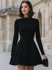 FJØRNA elegant black studded neckline dress for women, showcasing a stylish black dress with a fitted silhouette and decorative studs.