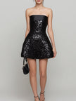 FJØRNA strapless satin-trim sequin A-line mini dress with shimmering sequins and sleek satin accents, perfect for evening wear.