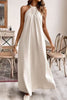 FJØRNA solid color loose halter neck backless casual maxi dress, perfect for weddings or casual occasions, shown in natural fabric.