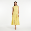 FJØRNA women's sleeveless lace panel midi dress displayed on a hanger, showcasing intricate lace details and elegant length.