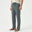 Men's linen drawstring trousers by FJØRNA, lightweight and breathable men's pants with an adjustable waistband and relaxed fit.