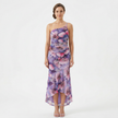 FJØRNA women's floral A-line maxi dress with a flowing silhouette and vibrant flower pattern, perfect for summer occasions.