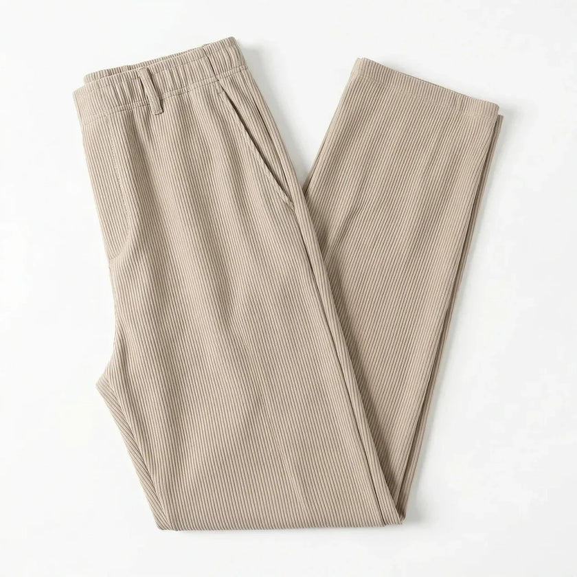 Men's wide-leg summer pants by FJØRNA, featuring lightweight fabric and relaxed fit, displayed on a model against a neutral background.