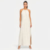 FJØRNA women's sleeveless halter neck summer maxi dress with flowing fabric and vibrant pattern, perfect for warm weather.
