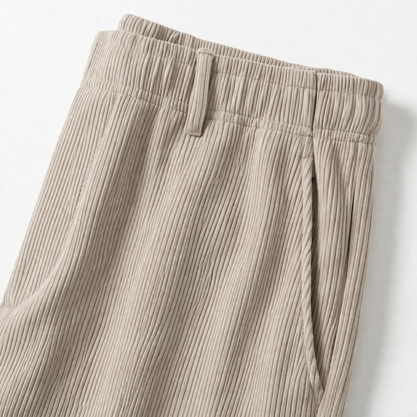Men's wide-leg summer pants by FJØRNA, featuring lightweight fabric and relaxed fit, shown in a natural stance.