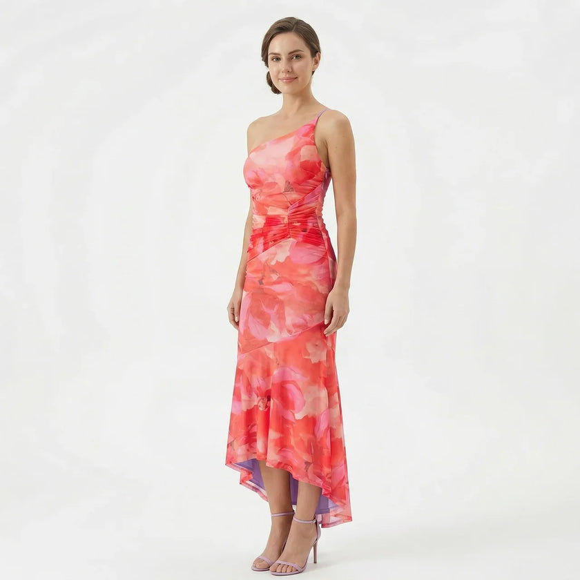 FJØRNA women's A-line floral maxi dress with a flowing silhouette and vibrant flower pattern, perfect for summer occasions.