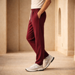 Men's wide-leg joggers by FJØRNA featuring drawstrings, comfortable fit, and casual style, shown in a relaxed pose.