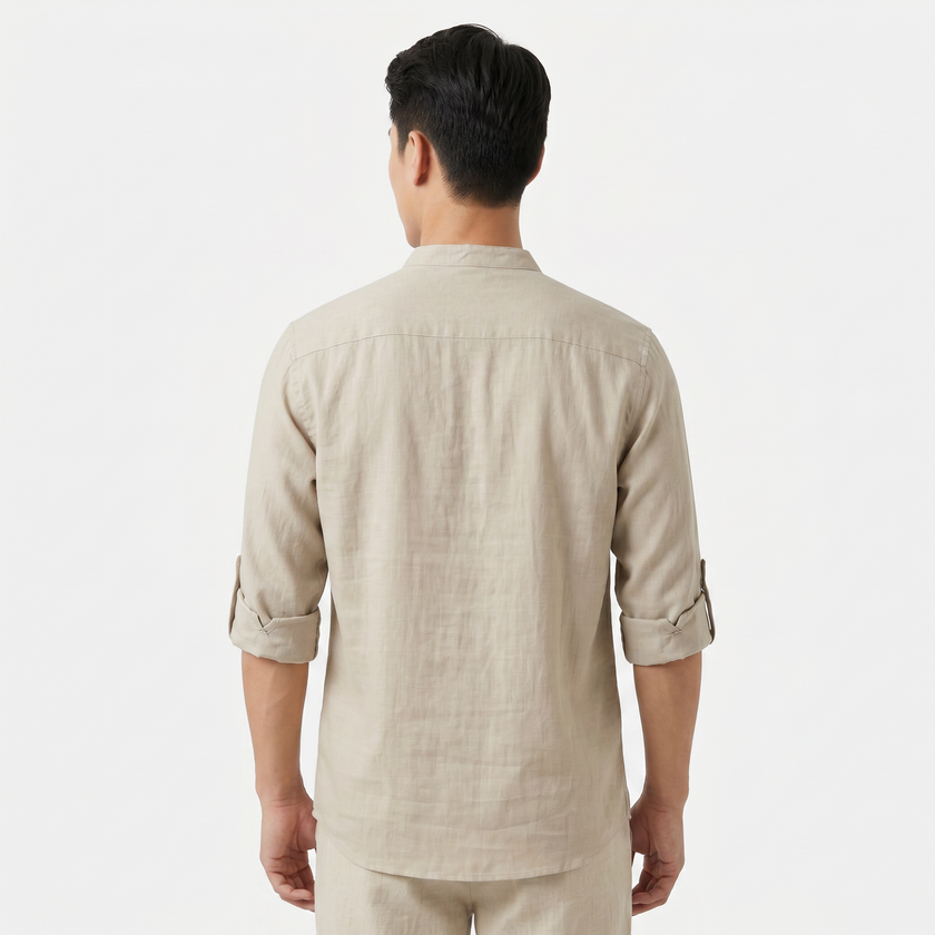 FJØRNA men's linen Henley shirt with grandad collar and rolled-up sleeves, perfect for casual summer wear.