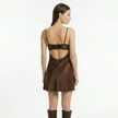Women's lace satin mini dress by FJØRNA featuring delicate lace details and a sleek satin finish, perfect for elegant occasions.
