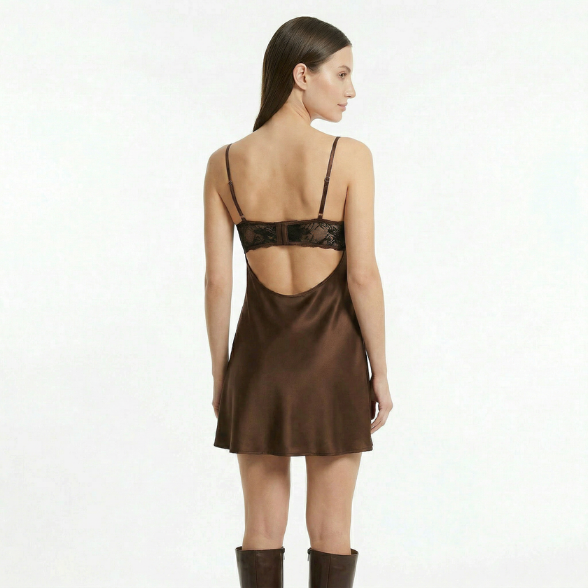 Women's lace satin mini dress by FJØRNA featuring delicate lace details and a sleek satin finish, perfect for elegant occasions.