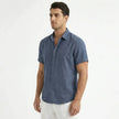 Men's cotton-linen short sleeve shirt by FJØRNA, shown in a relaxed fit with a button-up front and classic collar.