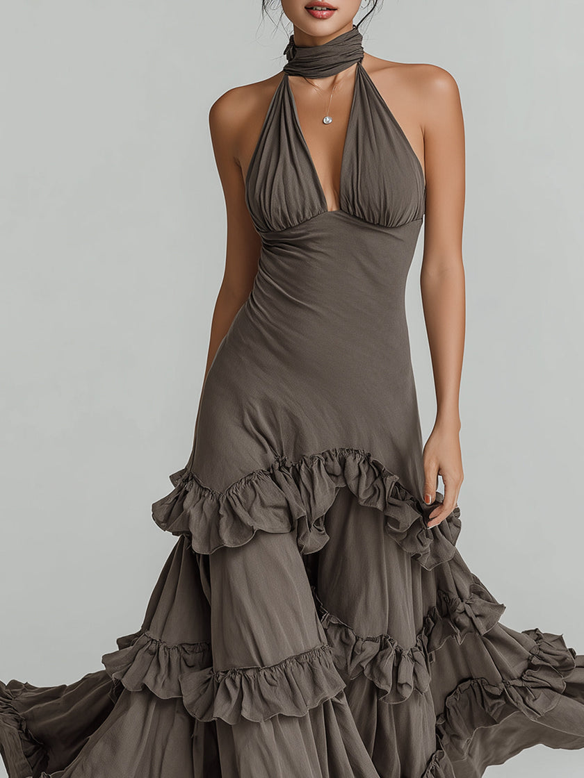 FJØRNA bohemian style halter neck ruffled maxi dress with flowing fabric and intricate detailing, perfect for summer and outdoor events.