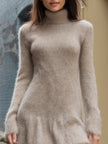 FJØRNA fuzzy turtleneck knit mini dress, stylish and cozy, shown in a close-up of the soft textured fabric and fitted silhouette.