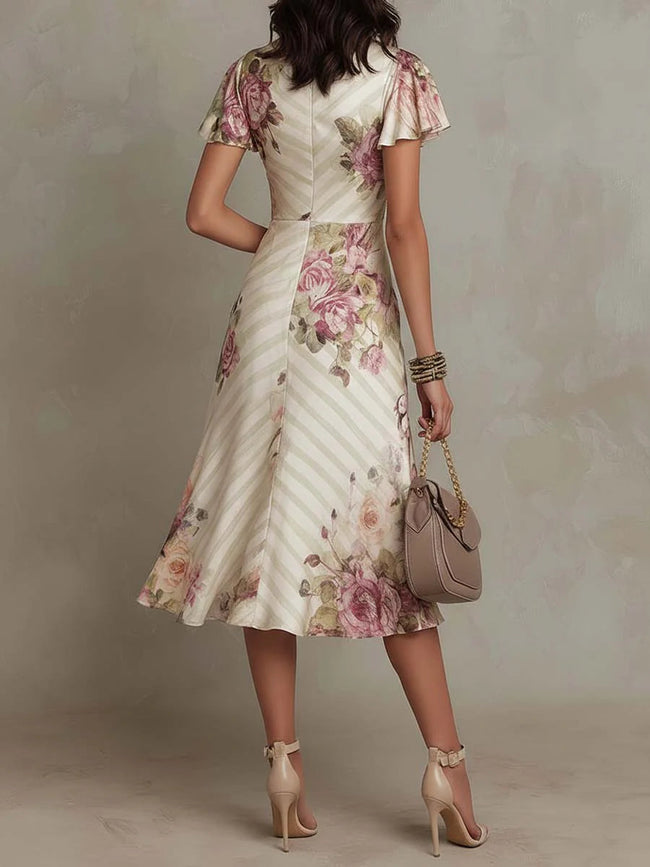 FJØRNA vintage floral satin women's midi dress featuring elegant design, perfect for day to night wear.