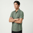Men's green embroidered short sleeve shirt with Aztec print and button-up design by FJØRNA, perfect for summer.
