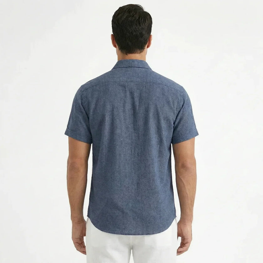 Men's FJØRNA cotton-linen short sleeve shirt, light fabric with a casual fit and button-up front, displayed on a hanger.