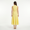 Women's sleeveless midi dress by FJØRNA featuring lace panels and a fitted silhouette, perfect for elegant occasions.