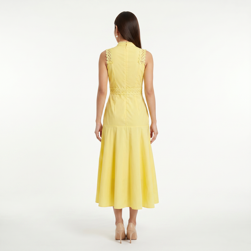 Women's sleeveless midi dress by FJØRNA featuring lace panels and a fitted silhouette, perfect for elegant occasions.