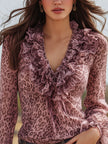 Pink leopard print chiffon blouse with ruffled lace V-neck, stylish FJØRNA blouse for a fashionable look.