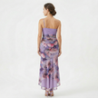 FJØRNA women's floral A-line maxi dress with a flowing silhouette and vibrant floral pattern, perfect for summer occasions.