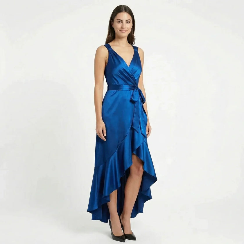 Women's elegant sleeveless wrap midi dress by FJØRNA, showcasing a stylish, flowy design perfect for sophisticated occasions.