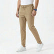 Men's stretchable comfort trousers by FJØRNA, shown in a relaxed fit with a versatile waistband and casual style.